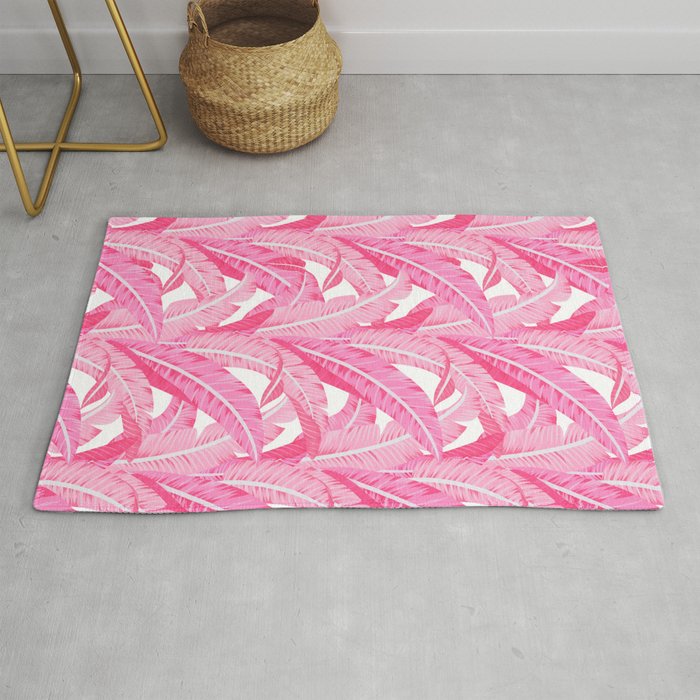 Pink banana leaves tropical pattern on white Rug
