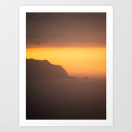 Orange sunset behind the mountains by the sea Art Print