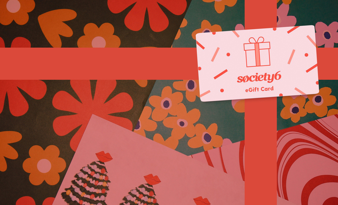 Society6 e-gfit card on a festive backdrop