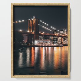 Brooklyn Bridge and Manhattan skyline at night in New York City Serving Tray