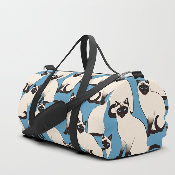 Siamese Cats crowd on blue Duffle Bag