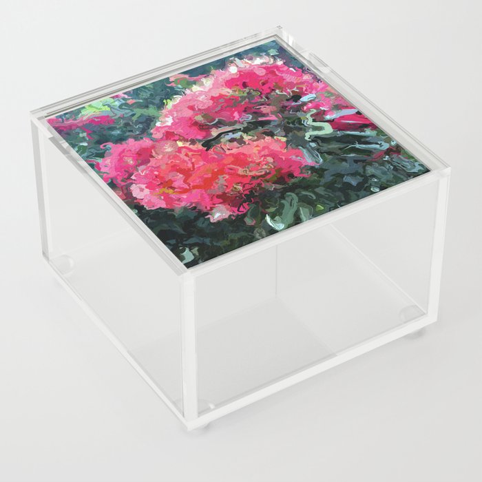 Red flower blossoms amid lush green foliage Acrylic Box