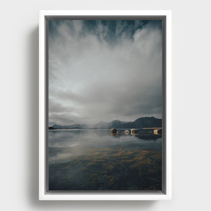 The calm before the storm Framed Canvas