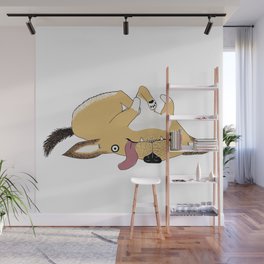 Puppy happily lying on their back Wall Mural