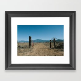 Mountains Through a Gate Framed Art Print