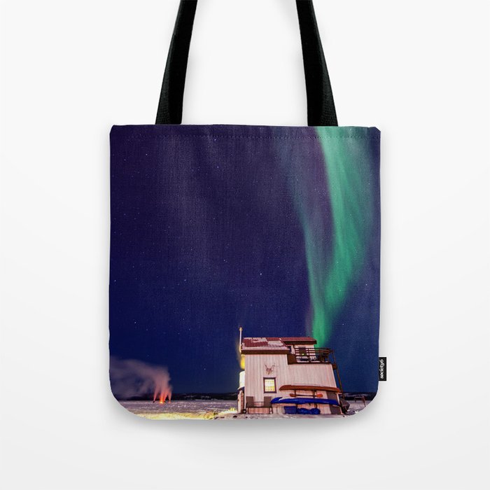 Northern Lights and house boat in Yellowknife Tote Bag
