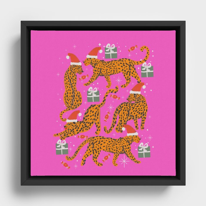 Fashionable cats with Christmas hats and gifts in fuchsia pink background  Framed Canvas
