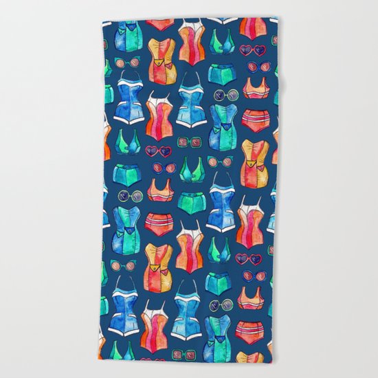 Sixties Swimsuits and Sunnies on dark blue Beach Towel