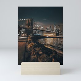 Brooklyn Bridge and Manhattan skyline at night in New York City Mini Art Print