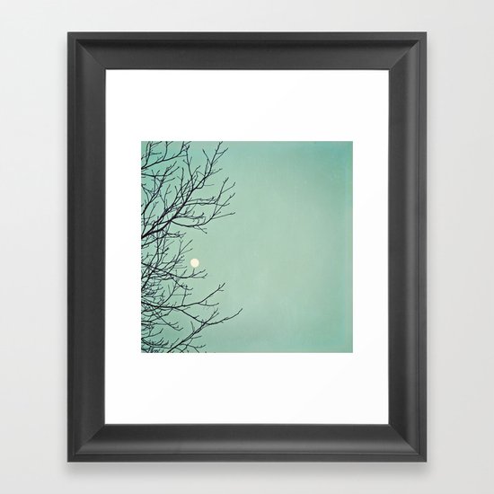 Holding the moon Framed Art Print