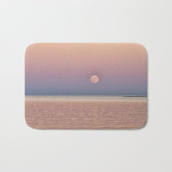 Full Moon rising over the ocean Bath Mat