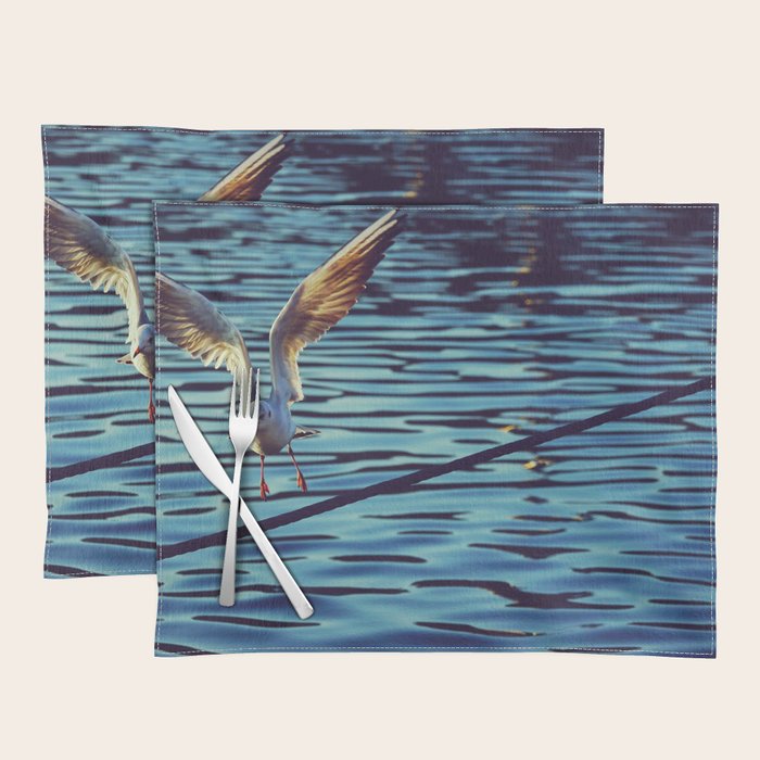 Gull jumping in flight Placemat by Carolina Reina Society6