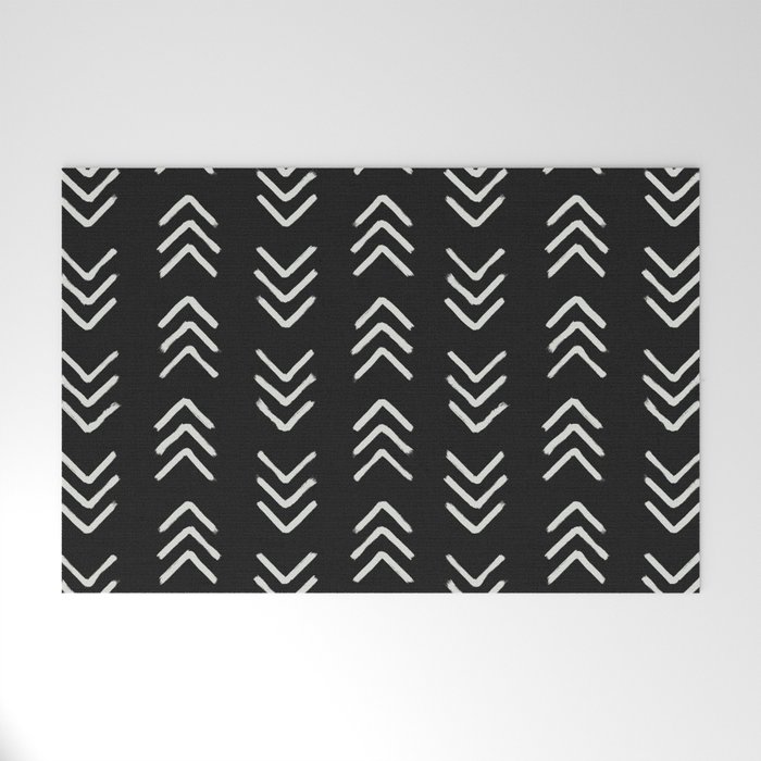 Charcoal & soft white brushed arrow heads, textured background Welcome Mat