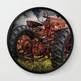 Abandoned Old Farmall Tractor in a Grassy Field on a Farm Wall Clock