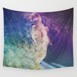 Astronaut dissolving through space Wall Tapestry