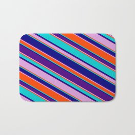 [ Thumbnail: Eyecatching Dark Turquoise, Blue, Indigo, Plum, and Red Colored Lined/Striped Pattern Bath Mat ]