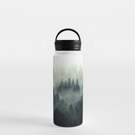 Green misty mountain pine forest in cloudy and rainy - vintage style photo Water Bottle