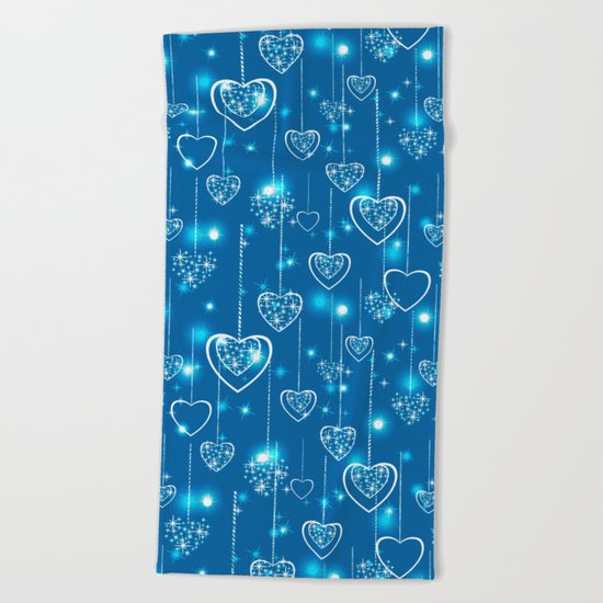 Bright openwork hearts on a light blue background. Beach Towel