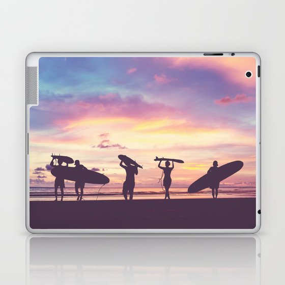 Silhouette Of surfer people carrying their surfboard on sunset beach, vintage filter effect with soft style Laptop & iPad Skin