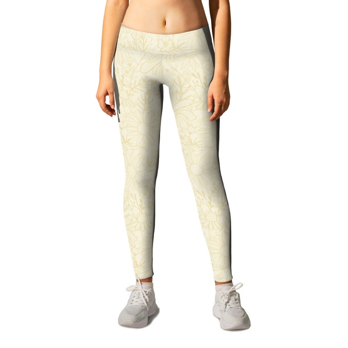 Light Cream Wildflower Pattern Leggings by justdoodlins Society6