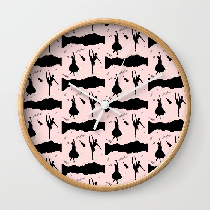 Two ballerina figures in black on pink paper Wall Clock