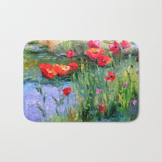 Poppies in a field near a pond Bath Mat