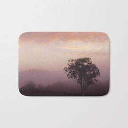 /// Bubble gum mornings /// Landscape photography of early morning tree in the fog at sunrise, NSW Australia Bath Mat