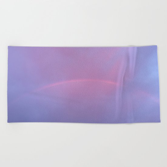 A Rainbow In A Sky Colored By The Sunset Beach Towel
