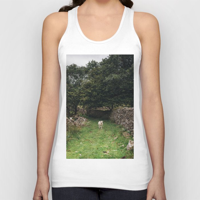 A small sheep walks along a farm track through trees in Cumbria. Tank Top