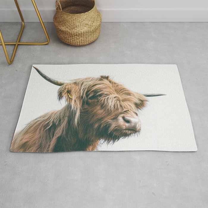 Majestic Highland cow portrait Rug