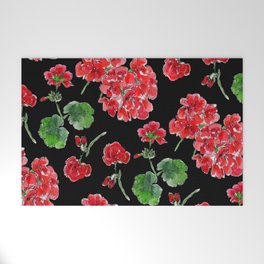 Red Geranium with black background Welcome Mat