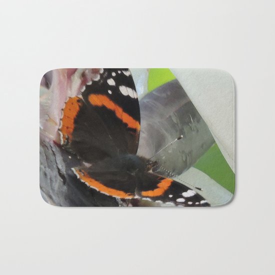 Red Admiral on a White Bird of Paradise Bloom Bath Mat