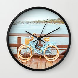 Two retro bicycles standing on Santa Barbara pier, California, USA. Vintage filter with muted teal blue and orange colors. Wall Clock