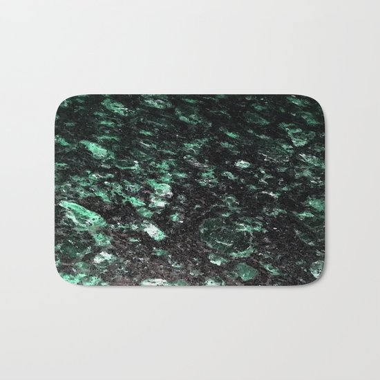 The Jade Sleeping Beneath the Black Granite Bath Mat