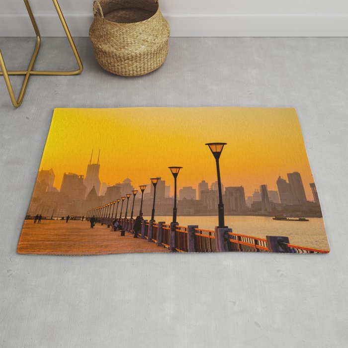 Sunset Cityscape by the River Rug