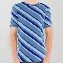 [ Thumbnail: Light Blue, Blue & Dark Blue Colored Lined/Striped Pattern All Over Graphic Tee ]