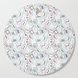 Mahjong Tiles Jumbled Across White Background With Swirls Cutting Board