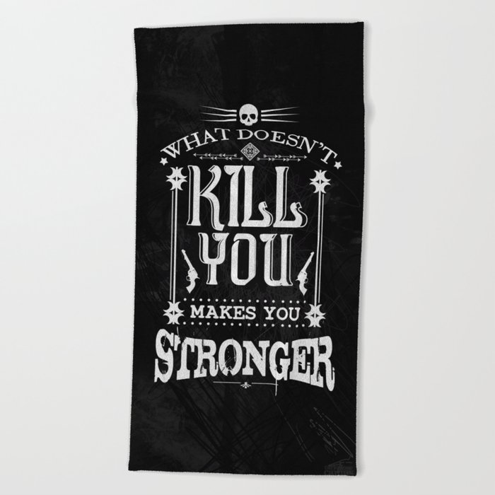 What Doesn't Kill You Makes You Stronger Beach Towel