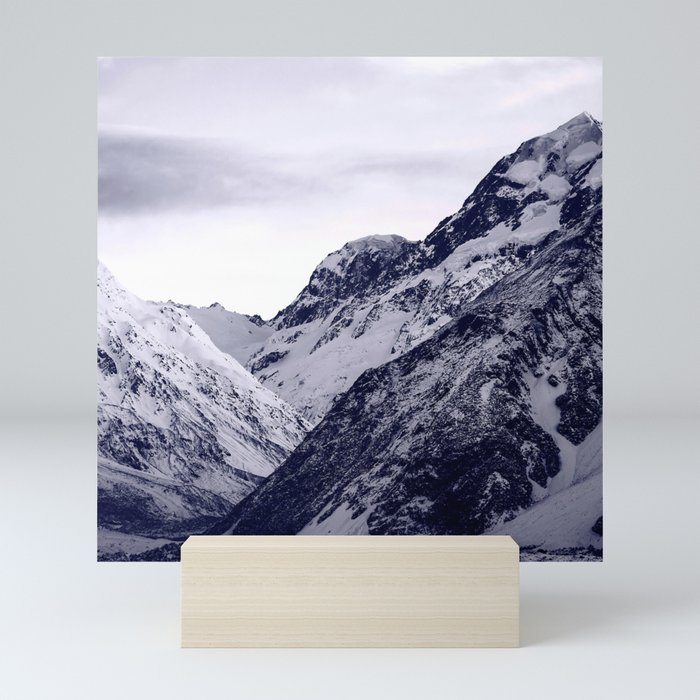 Snow-Covered Rocky Mountains Covered By Moody Sky Mini Art Print