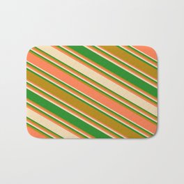 [ Thumbnail: Coral, Tan, Forest Green, and Dark Goldenrod Colored Stripes/Lines Pattern Bath Mat ]