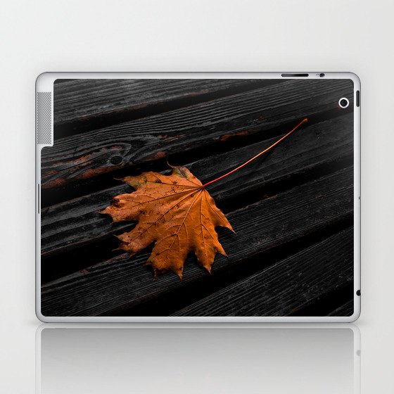 Orange autumn maple leaf on the wooden boards dramatic scene Laptop & iPad Skin