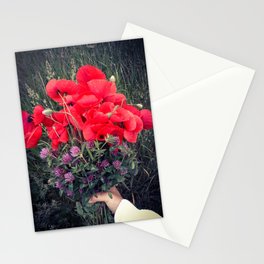 Summer red poppies and clover bloquet in woman's hand field essence Stationery Card