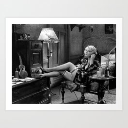 Jazz Age Roaring Twenties blonde in stockings on the telephone for night out and drinking black and white female photograph Art Print