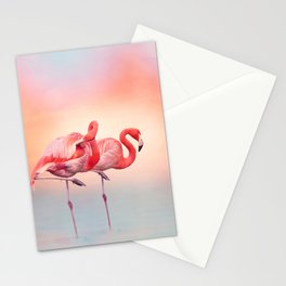 Two Pink flamingos in the water at sunset Stationery Card