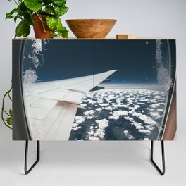 Airplane window and white clouds Credenza