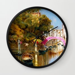'A Sunlit Canal in Venice' landscape painting by Antonio Maria de Reyna Wall Clock