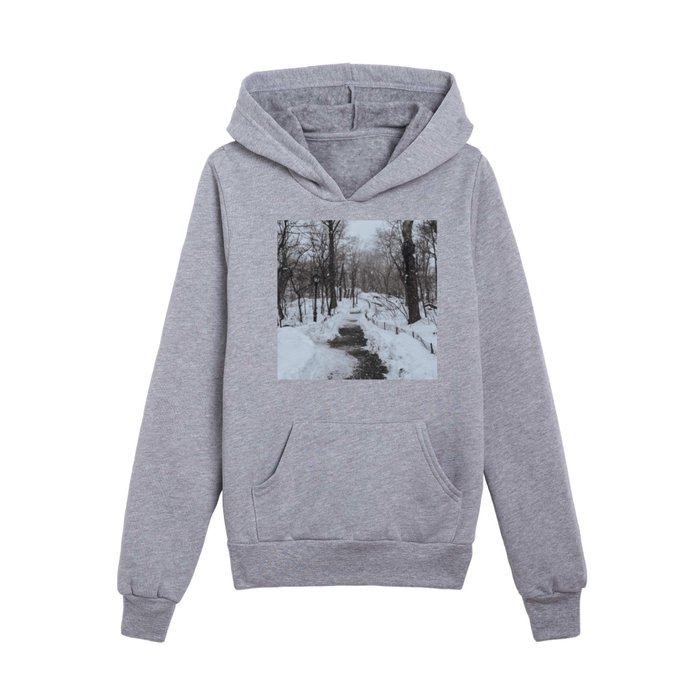 Central Park during winter snowstorm blizzard in New York City Kids Pullover Hoodie