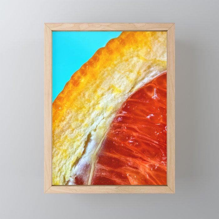 Orange in macro Framed Mini Art Print