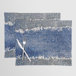 Denim frame. Ripped denim fabric with fringe edge on bleached denim background, text place, copy space. Worn Jeans Casual Double Color patch. Classic blue denim pattern texture  Placemat