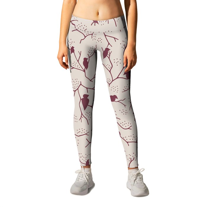 Red tree brunches and birds on tan background Leggings